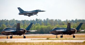 F-16s train alongside F-35s in skies over Eglin F-16 & F-35s at Eglin Air Force Base Fla
