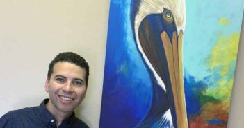 Kelly Pierre named 2019 Festival of the Arts poster contest winner Kelly Pierre with Festival of the Arts Poster