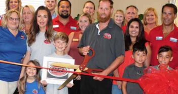 Polishing Systems, Inc. celebrates with a Chamber ribbon cutting Larry and Kendra Tucker, PSI chamber of Commerce