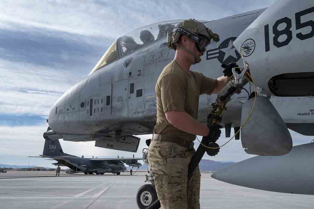 U.S. Air Force Staff Sgt. Daniel Watford fuels up an A-10C Thunderbolt II