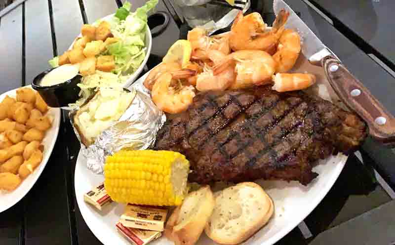 Tomahawk ribeye steak dinner at the Wharf 850