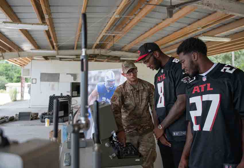 eglin air force base Atlanta Falcons football team members visit
