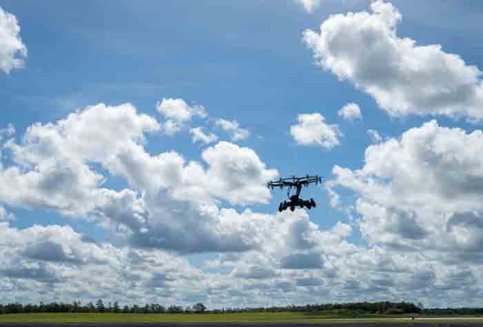 The Hexa, an electric, vertical takeoff and landing aircraft, hovers in the air