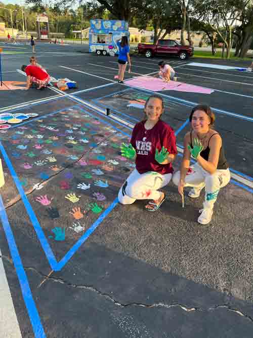 Niceville High School, painting party, personalized parking spaces, seniors, class of 2023