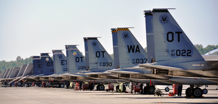 Aircraft from test and evaluation squadrons across the Air Force line up on the Joint Base Elmendorf-Richardson flightline.