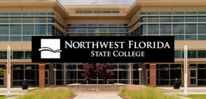 Entrance to a building at Northwest Florida State College building with college logo displayed