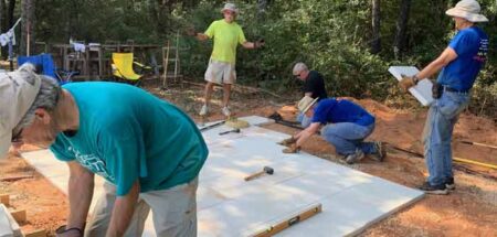niceville kiwanis club members building patio