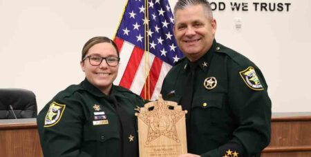 Tori Mason, Okaloosa County Sheriff's Office 2021 School Resource Officer of the Year, with Sheriff Eric Aden