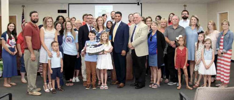 Allyson LaVictoire with family, friends, and school district officials following her appointment as principal at Riverside Elementary School