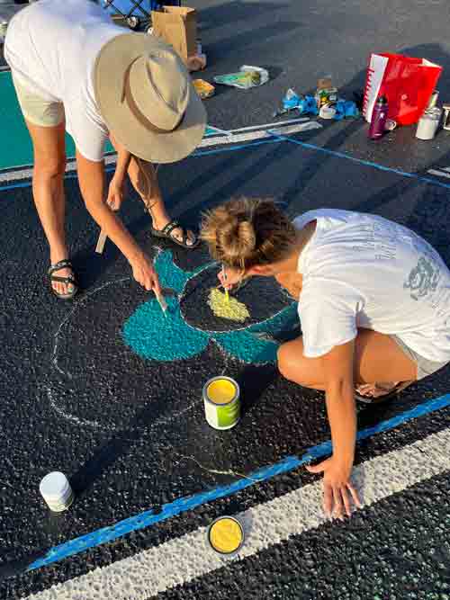 Niceville High School painting party personalized parking spaces for seniors class of 2023