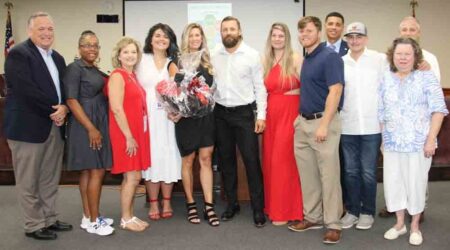 Kimberly Sears with family, friends, and school district officials