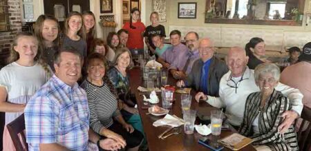 Duggar Family seated at table