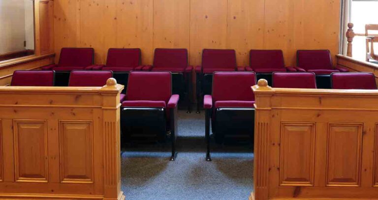 Seats of the jury box in a courtroom