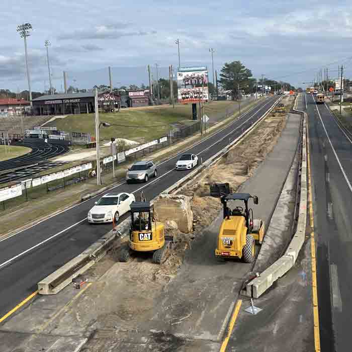 aerial view, heavy construction equipment in median on john sims parkway in niceville