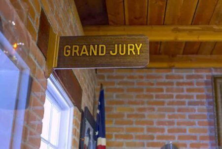 old-style Grand Jury sign at courthouse