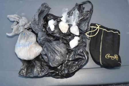 Several baggies, Crown Royal bag and shopping bags containing narcotics
