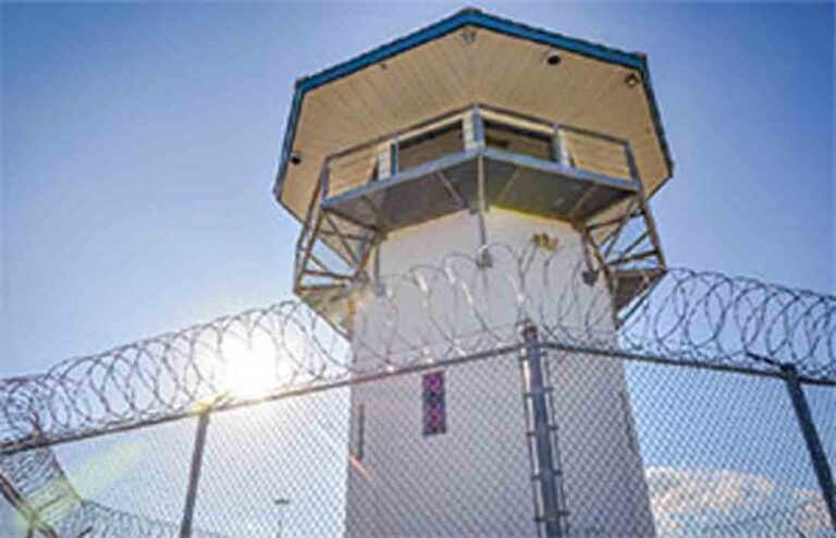 Florida Department of Corrections guard tower above fencing