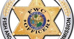 Florida Fish and Wildlife Conservation Commission Division of Law Enforcement badge, cropped, close-up view.