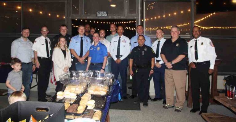 Group photo of award-winning law enforcement officers, firefighters, and emergency medical technicians.