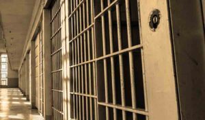 Prison bars and a hallway