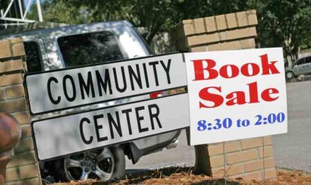 book sale sign posted in front of Niceville Community Center sign