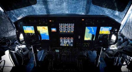 digital C-130H cockpit with lighted avionics and navigation display