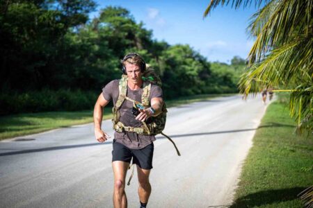 participant rucks in EOD Warrior Challenge in Niceville, Fla.