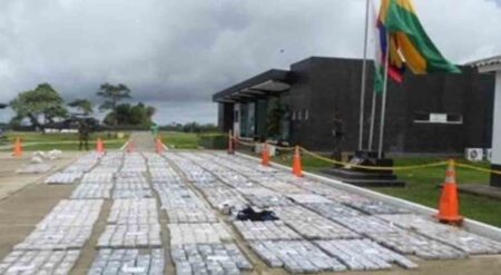 dozens of packages of cocaine laid outside of a government building in Capurgana, Colombia