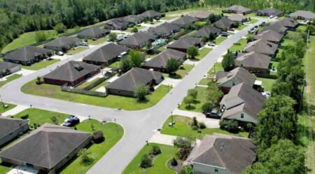 aerial view of a neighborhood in north okaloosa county, Florida, with about three dozen ranch-style homes