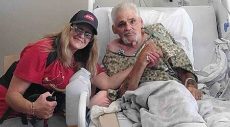 Marie and Michael Maher of Niceville, Florida. Mike Maher is in a bed at a hospital.