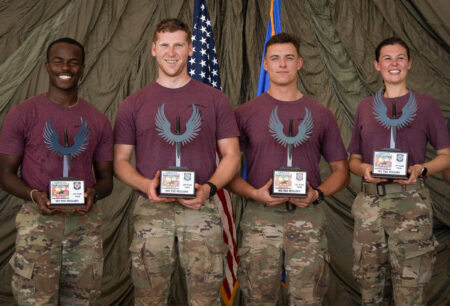 Four members of the 96th Medical Group at Eglin Air Force Base displaying their awards presented at the 15th annual Medic Rodeo