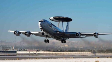 A Boeing E-3 Sentry (AWACS) departs Nellis Air Force Base to participate in Red Flag