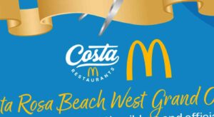 A promotional banner for Costa Restaurants featuring the McDonald's logo and text announcing the Santa Rosa Beach West Grand Opening.