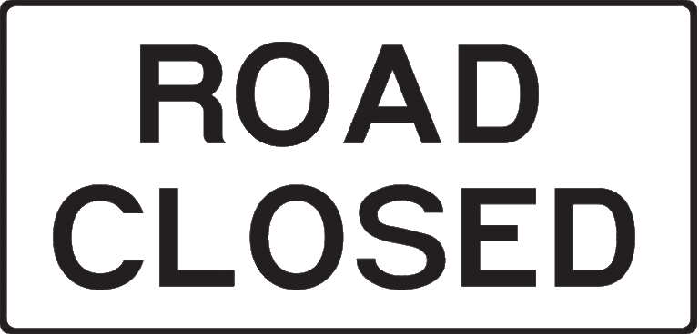 A rectangular black-and-white sign with bold, capitalized text reading "ROAD CLOSED."