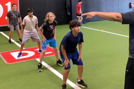 Youth athletes follow coach instructions at D1 Training in Niceville.
