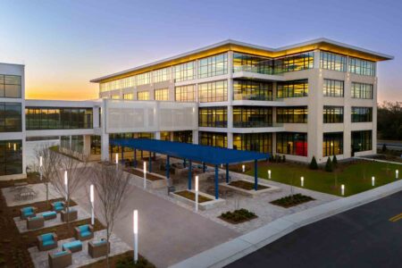 Eglin Federal Credit Union’s new four-story Operations Center in Fort Walton Beach at sunset.