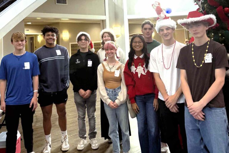 Members of the Niceville Youth Advisory Council pose during a holiday event