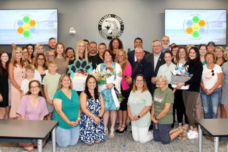Laura King surrounded by supporters after being named principal of Davidson Middle School