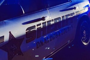 Okaloosa County Sheriff’s Office patrol vehicle with logo at night