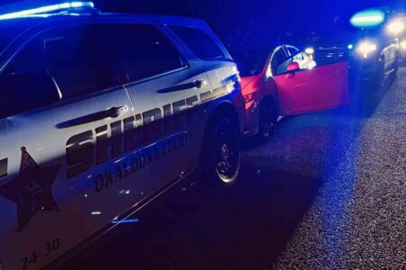 Okaloosa County Sheriff’s Office patrol vehicles at night during DUI traffic stop