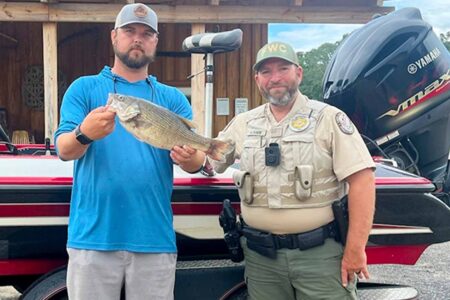 Angler Joe Durden and FWC Officer Wil Raker with record spotted bass