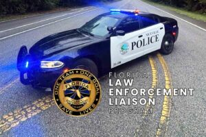 Niceville Police patrol car with lights on representing recognition from the Florida Law Enforcement Liaison Program.