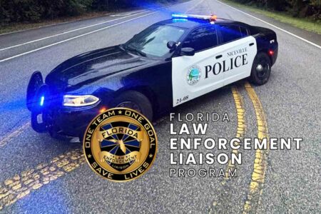 Niceville Police patrol car with lights on representing recognition from the Florida Law Enforcement Liaison Program.