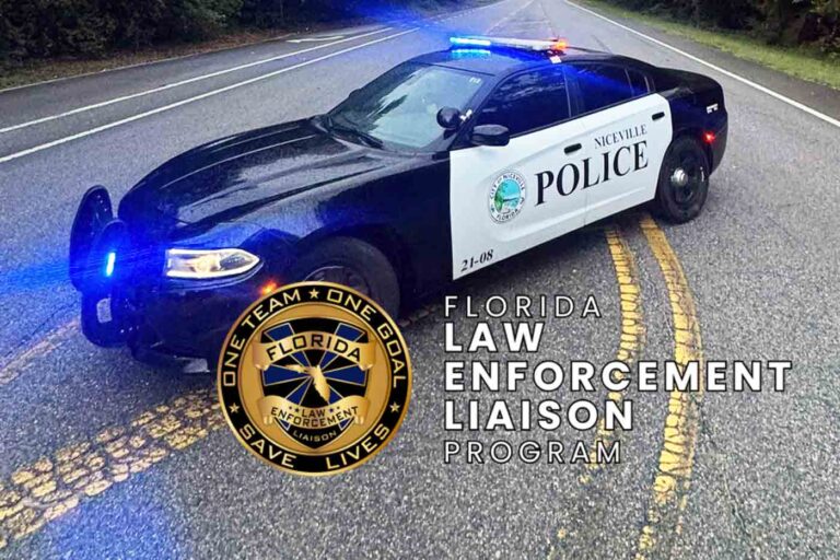 Niceville Police patrol car with lights on representing recognition from the Florida Law Enforcement Liaison Program.