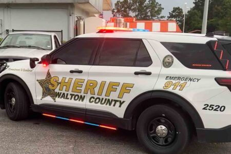 Walton County Sheriff's Office patrol vehicle with lights activated