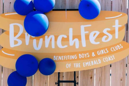 BrunchFest event sign with blue balloons