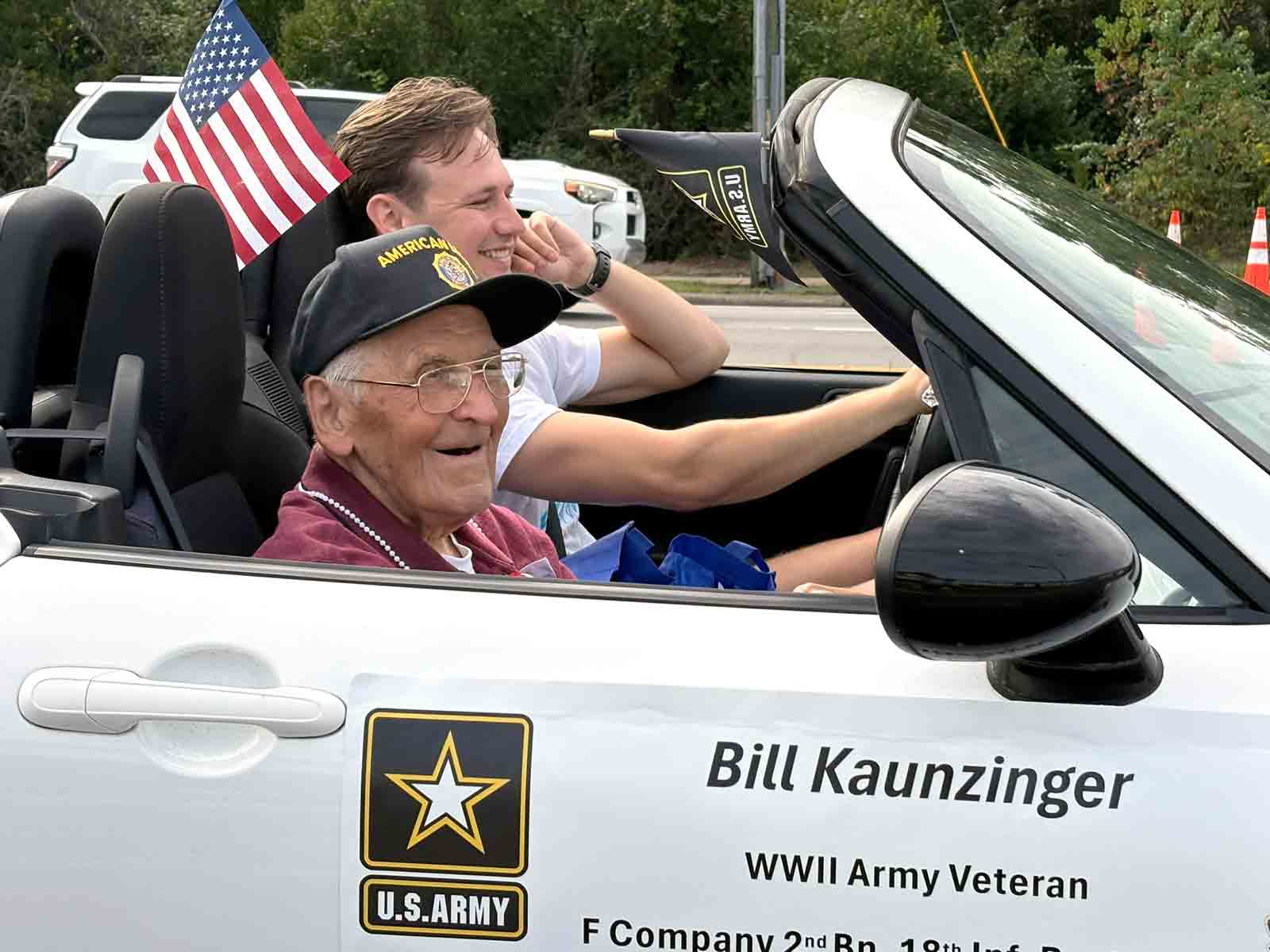 World War II Army veteran Bill Kaunzinger rides in the 2024 Niceville Veterans Day Parade.