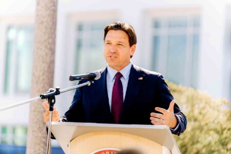 Florida Governor Ron DeSantis speaks at the ribbon cutting for the expanded South Walton Center in Santa Rosa Beach.