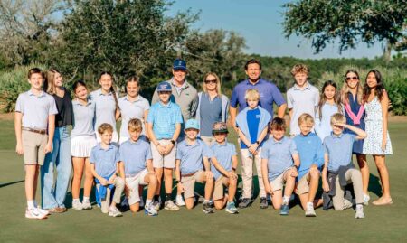 Group photo of participants, including students and adults, at Camp Creek Golf Course during Tom Glavine’s Field of Dreams Golf Outing in Santa Rosa Beach, Florida.