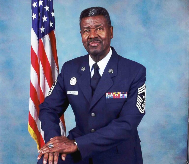 Retired CMSgt Les Chambers to lead Niceville Veterans Day Parade Retired U.S. Air Force Chief Master Sergeant Les Chambers poses in uniform beside the American flag.